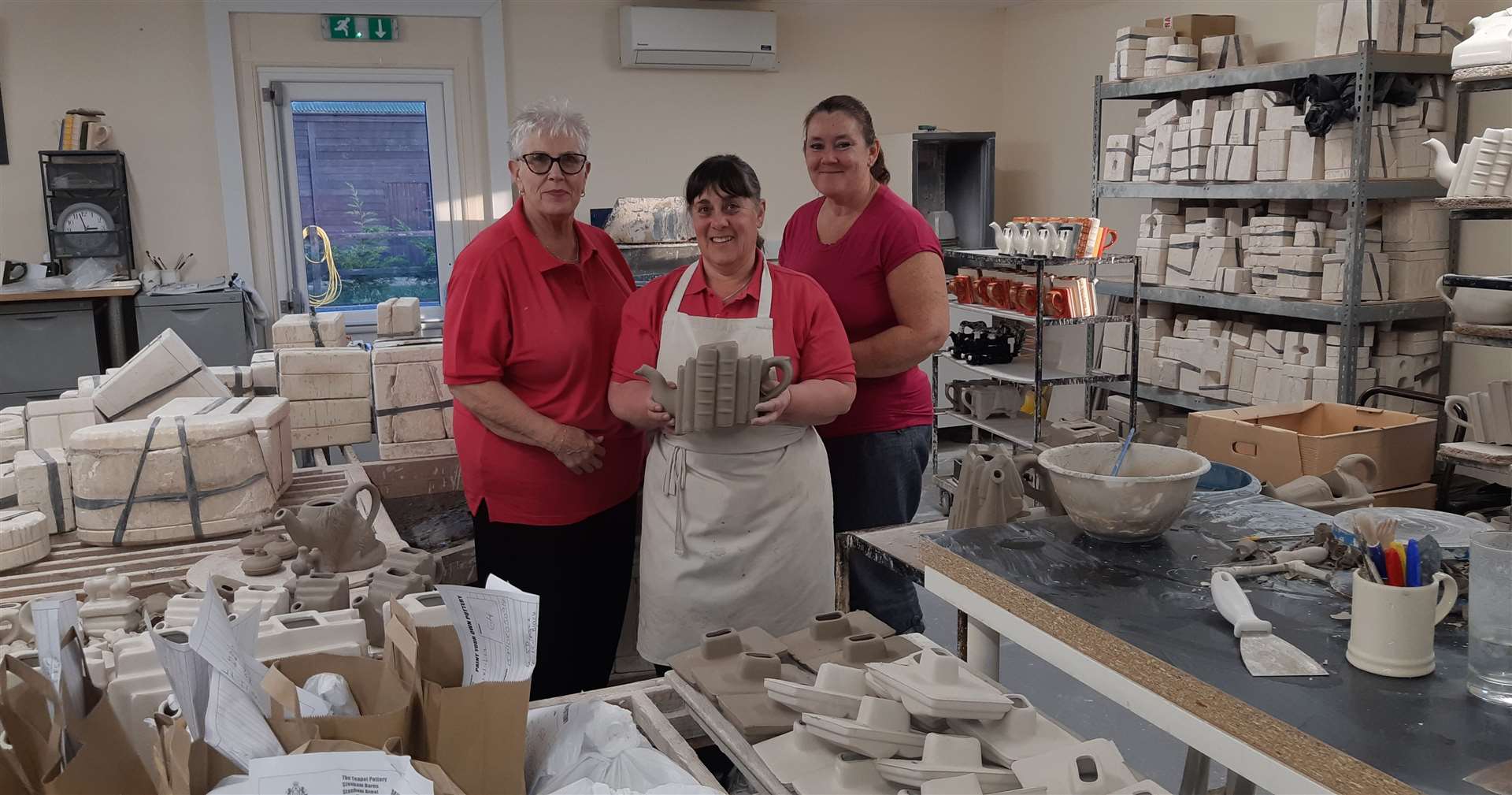 Pottery staff (L-R) Carol Bridges, Jil Davey and Tracey Maskell in the pottery at Carters of Suffolk