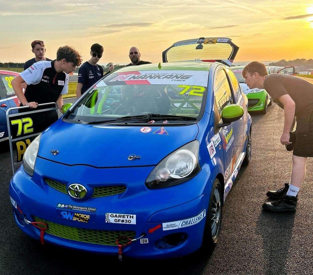 The motorsport engineering students from West Suffolk College in the assembly area at Donington Park Circuit. Picture: Cat Haken