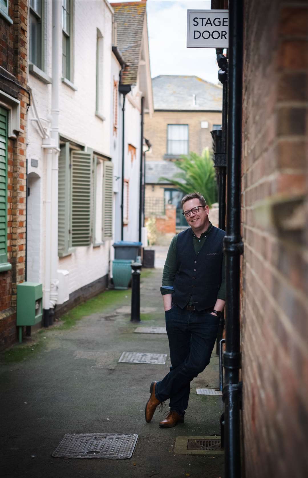 Tom Appleton by the stage door of the Jubilee Hall in Aldeburgh. Photo Adam Barnes