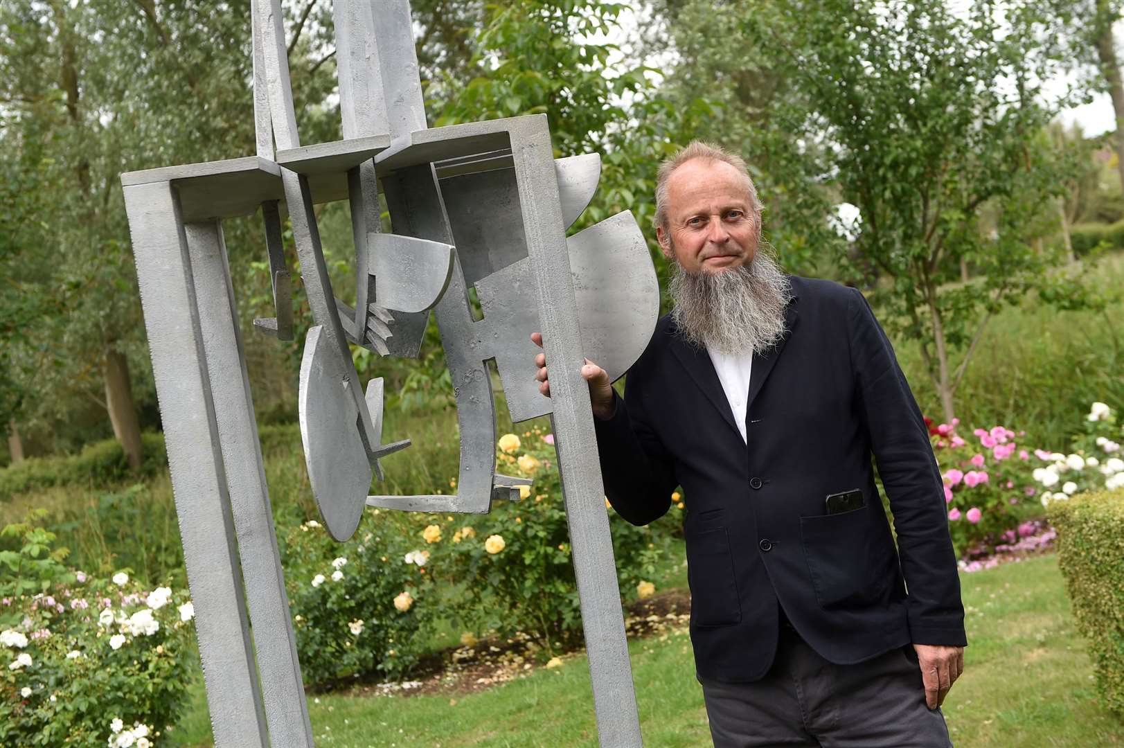 Chappel Galleries has reopened to the public after being closed during lockdown to showcase a coastal scenes watercolours exhibition with a range of sculptures...Pictured: Sculpter Jonathan Clarke with his piece 'Dive'...PICTURE: Mecha Morton.... (37033015)