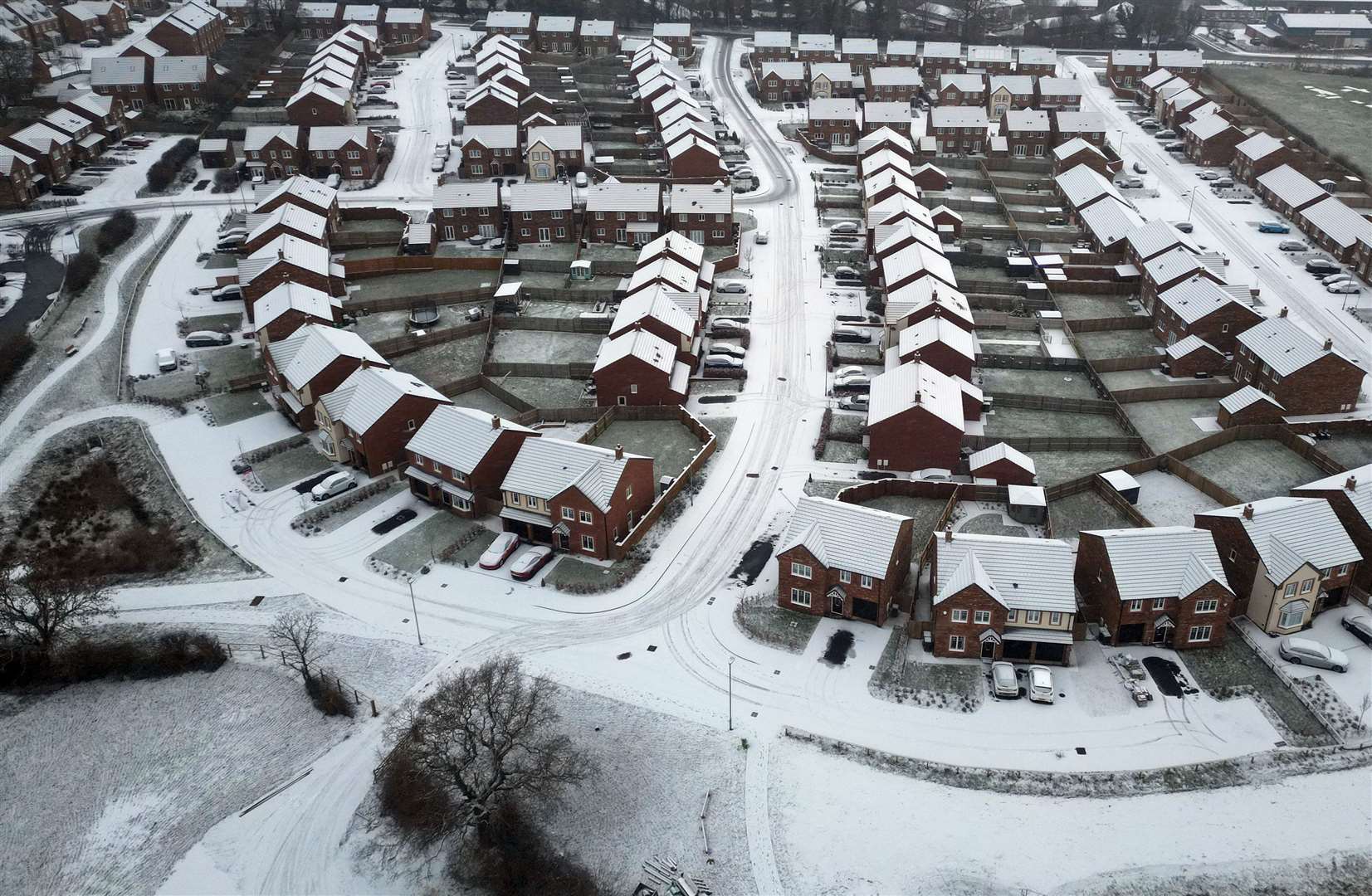 Snow-covered rooftops could be seen near Carlisle in Cumbria (Owen Humphreys/PA)