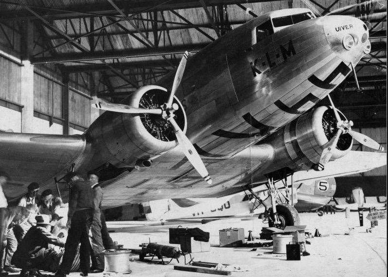 A tyre is inspected on one of the plances before the Mildenhall to Melbourne air race in 1934. Photo Mildenhall Museum