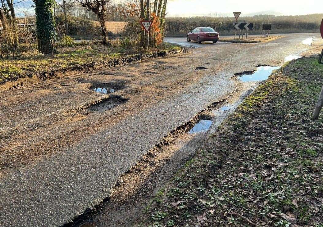 The Avenue, near the junction with the A143, before Tom Lamb carried out temporary repairs