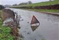 Flooded road to remain closed after 36,000 gallons of water removed with more work needed