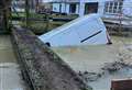 Lucky escape for driver after van swept away by floodwater