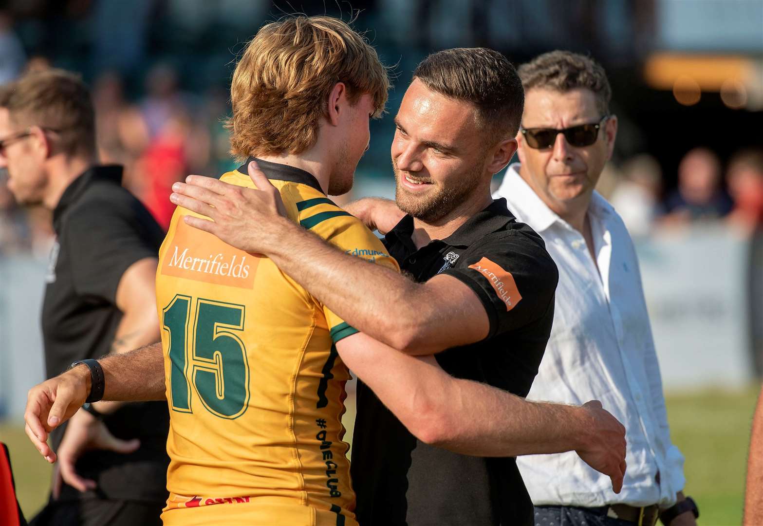 Bury St Edmunds head coach and director of rugby Jacob Ford congratulates young full-back George Loose after a pleasing display in front of the home fans Picture: Mark Westley