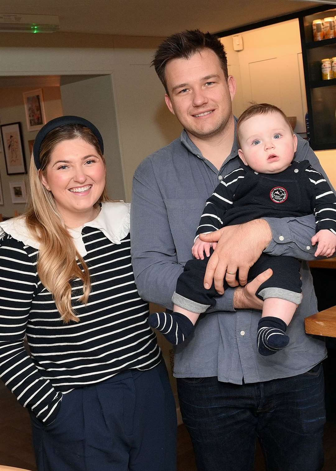 Lucy and Francois Pretorius inside the restaurant with Hugo – Lucy said they have lots of happy memories there. Picture: Mecha Morton