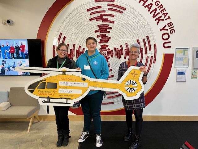 From left: Haverhill Running Club members Lynette Garstang, Lewis Garstang and the EAAA's community fund-raising manager Zoe Harris. Contributed picture