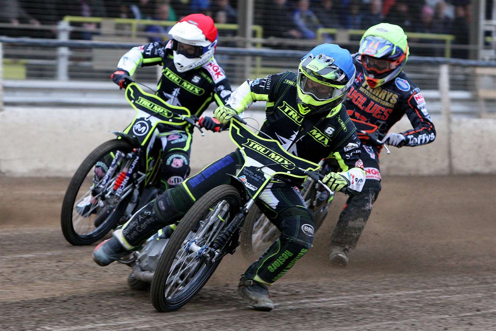 Danyon Hume, blue, and Emil Sayfutdinov lead Rory Schlein on Wolves last visit to Foxhall. The Wolves are back in Suffolk tomorrow night. Photo: Phil Hilton