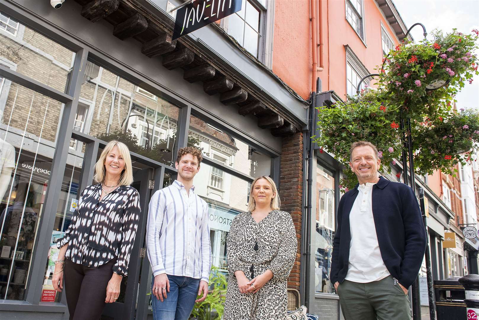 Assistant manager Hannah Hansford, sales advisor Ben Goodwin, with Joanna and Jeremy Clayton