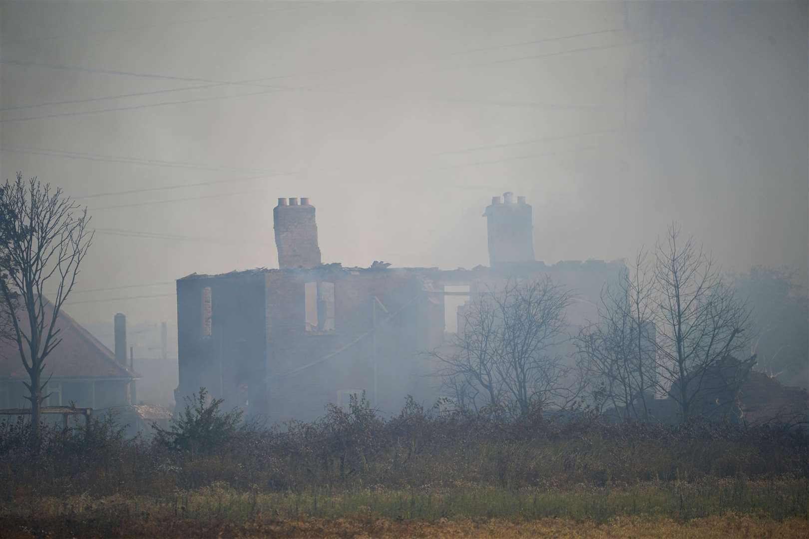 The Wennington blazes left nearly 20 houses destroyed in July 2022 as temperatures soared over 35C (Yui Mok/PA)