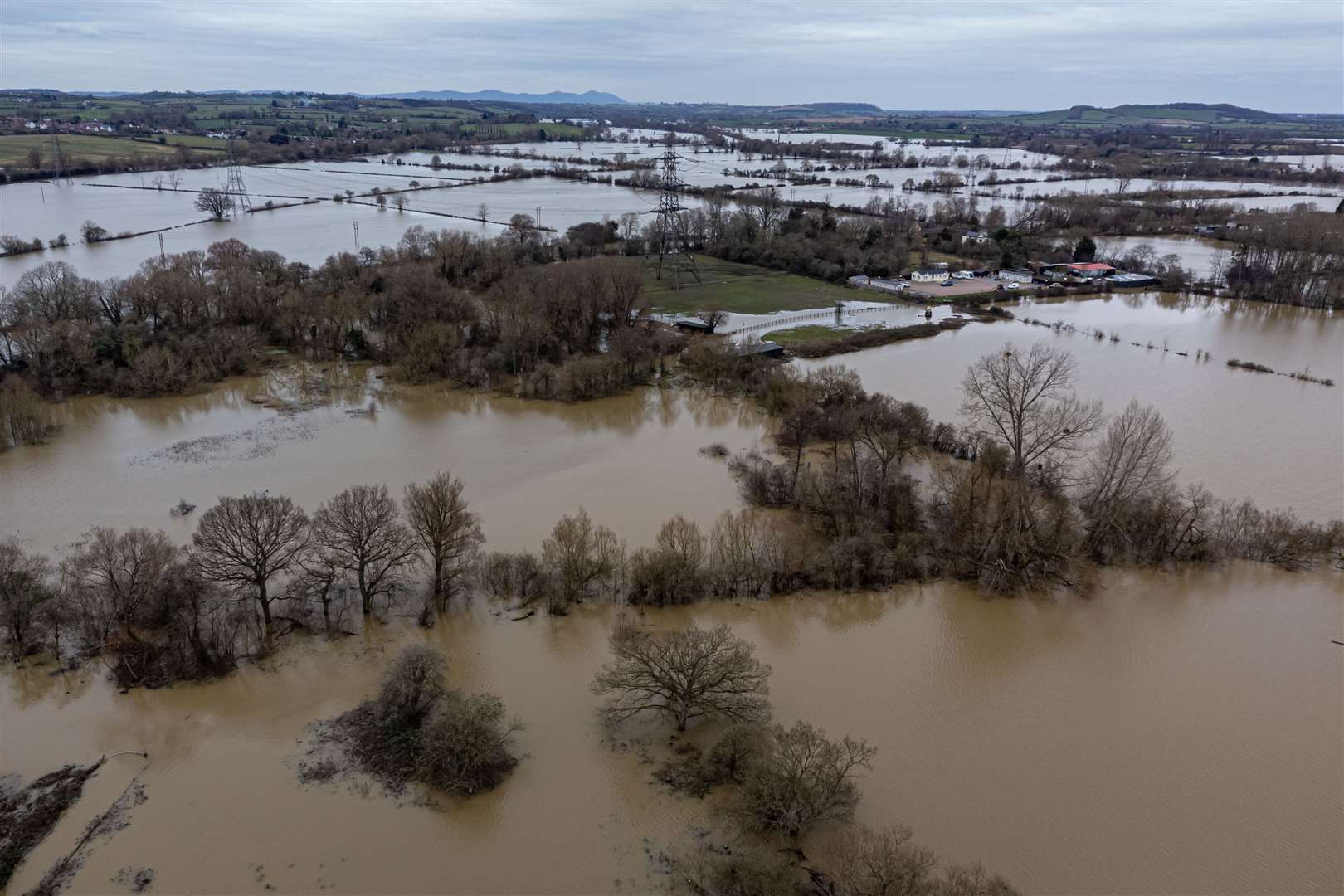 Flood water on the outskirts of Gloucester earlier this month (Ben Birchall/PA)