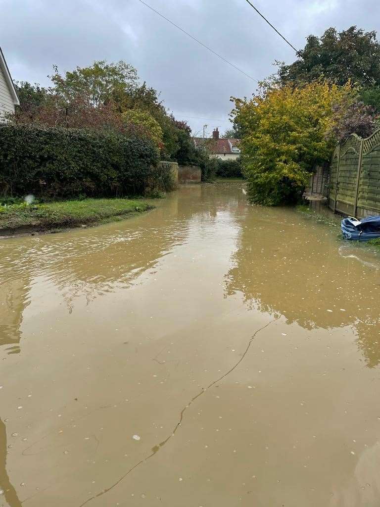 The close completely submerged, with no road visible. Picture Derry Hart